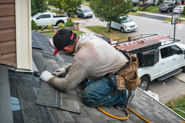 Professional Flat Roof Repair technician working in Highland, MD